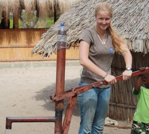 photo courtesy of the Traveling School, pumping water in school