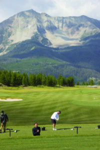 The driving range at The Reserve, where golfers use Fan Mountain as a target.