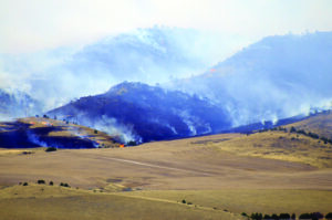 Smoke billows from the Eustis Fire south of Toston, Mont., on Aug. 14. The blaze grew to 8,721 acres before firefighters fully contained the fire on Aug. 19.