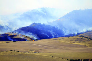 Smoke billows from the Eustis Fire south of Toston, Mont., on Aug. 14. The blaze grew to 8,721 acres before firefighters fully contained the fire on Aug. 19. 