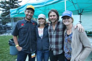 The author Eric Ladd, Jessie Wiese, Lukas Nelson and Kathy Lynch pose for a photo before the show.