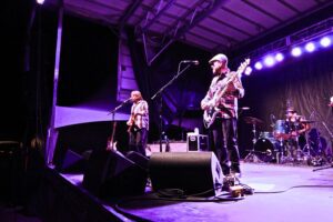 Lukas Nelson, at left, and bassist Corey McCormick tear through a moving set in Jackson, Wyo.