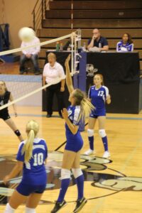 Rowan Merryman looks on as Carter Johnsen spikes the ball during the Big Horn’s junior varsity volleyball game on Sept. 17 at Shields Valley. PHOTO BY MONA LOVELY