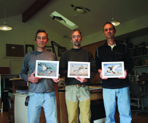 James, Joseph and Robert Hautman with their paintings that swept the top three spots in the 2015 Federal Duck Stamp Contest. PHOTO COURTESY OF JOSEPH HAUTMAN
