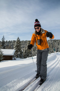 From wobbly first steps to smooth gliding, the author introduces his younger sister Julie to the sport of Nordic skiing at Lone Mountain Ranch.  PHOTO BY WES OVERVOLD