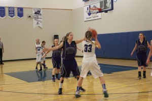 Sophomore point guard Carter Johnsen squares up to shoot. Johnsen was one of three junior varsity players who scored in the Big Horns’ varsity win against the Sheridan Panthers on Jan. 23. 