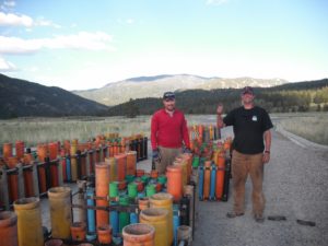Big Sky pro ski patrollers and licensed blasters Ross Titilah (at left) and Rob Wood prep behind the scenes for the Big Sky July Fourth fireworks display. 