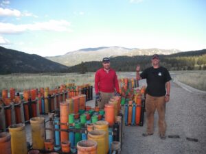 Big Sky pro ski patrollers and licensed blasters Ross Titilah (at left) and Rob Wood prep behind the scenes for the Big Sky July Fourth fireworks display.