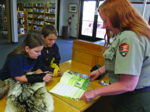 Junior Rangers in the Mammoth Visitor Center; Jim Peaco; April 2015; Catalog #20225d; Original #IMG_9694