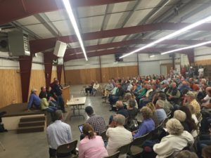 A crowd at the Park County Fairgrounds in Livingston listens to Fish, Wildlife and Parks officials address concerns about the Yellowstone River fish kill and its economic impact on the area. PHOTO BY AMANDA EGGERT 