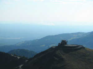 The Cygnet Fire burns in the background of this 2012 photo of Mount Washburn lookout. PHOTO COURTESY OF NATIONAL PARK SERVICE