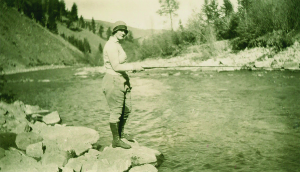 A friend of Lilian Crail visiting from Chicago casts a line into the Gallatin River below Jack Smith Bridge. Named for a homesteader who ranched along the Gallatin, this area of the stream approximately 1 mile north of Big Sky remains a popular fishing hole today.