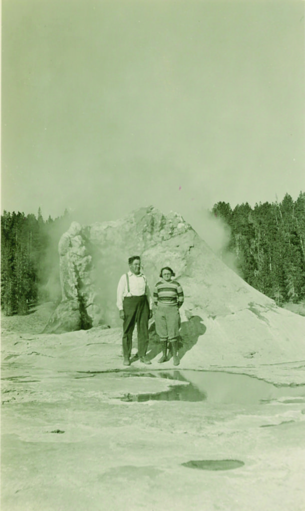 Eugene Crail and his wife Alice pose perilously close to a smoldering geyser in Yellowstone National Park. The park eventually constructed more than 14 miles of boardwalks to preserve thermal features and protect tourists.