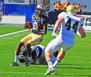 Freshman quarterback Chris Murray scrambles for yardage during the Bobcats’ 27-24 win over Bryant on Sept. 10. 