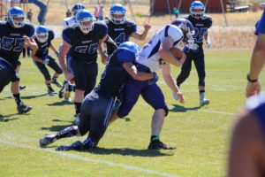 Lone Peak’s Zach Cone makes a tackle during a dominant defensive performance by the Big Horns. 