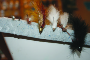 The best flies for late fall fishing are (from left to right): Sprout Beatis Emerger, Beadhead Zebra Midge, Parachute Purple Haze, Sparkle Minnow, Zuddler, Chubby Chernobyle and the Sculpzilla. PHOTO BY PATRICK STRAUB 
