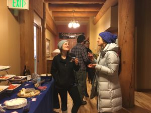 People lingered over an abundance of snacks and beverages long after the official end of the Big Horn Center holiday open house event on Dec. 2.  PHOTOGRAPH BY SARAH GIANELLI  