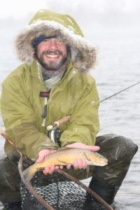 Can a powder day get any better? Perhaps if you had a little fishing to it. Winter fishing can be both challenging and rewarding. PHOTO BY PAT STRAUB 