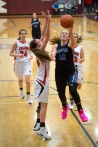 Junior post KP Hoffman scored 18 points during Lone Peaks Feb. 24 game against Twin Bridges at the Western C Divisional Tournament in Butte. PHOTO BY RICH ADDICKS 