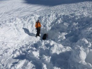 The survival of a skier or rider buried by an avalanche depends on companions digging them out quickly—techniques like strategic shoveling can significantly improve those odds.