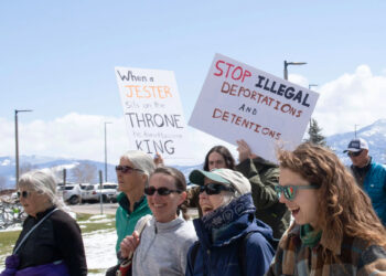 Protestors march from the Brick Breeden Fieldhouse during a April 18 protest against the revocation of MSU international students' visas. PHOTO BY LOGAN ROSS