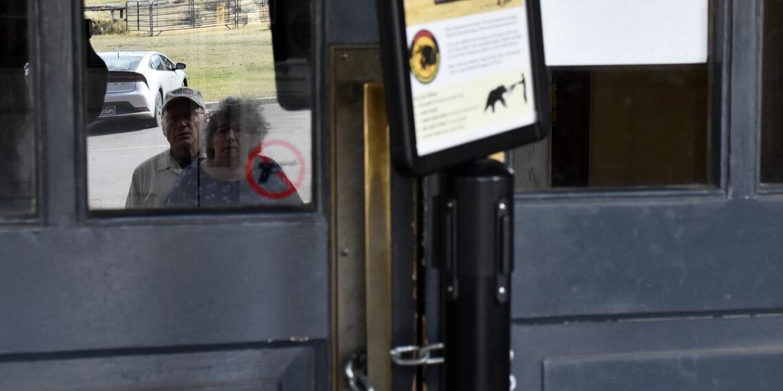 Park visitors find open gates at Yellowstone on first day of government shutdown 