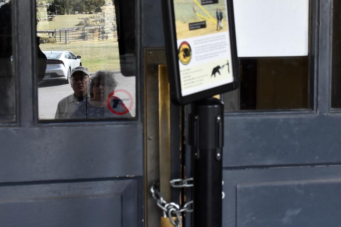 Park visitors find open gates at Yellowstone on first day of government shutdown 
