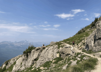 Hikers head toward Granite Park Chalet in Glacier National Park on the Highline Trail. PHOTO BY KIELA SZPALLER VIA DAILY MONTANAN