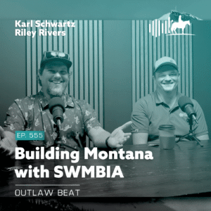 Podcast cover: two men at microphones in a studio, title 'Building Montana with SWMBIA', episode 'EP.555', and hosts Karl Schwartz and Riley Rivers, with 'Outlaw Beat' subtitle.