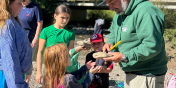 Students collect rocks for art installation at Big Sky Resort