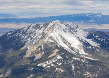 Fan Mountain's south face shows how a warm, mostly dry winter marked southwest Montana last winter. Photo by Jack Reaney.